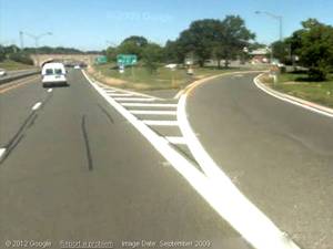 Exit W3 in 2009 with the parkway's crooked lamp posts, courtesy of street view on Google Maps ...