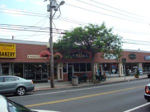 After it was gutted by fire a number of years ago, Sayville Pizza was completely rebuit.  Above is a picture of what it looks like today.