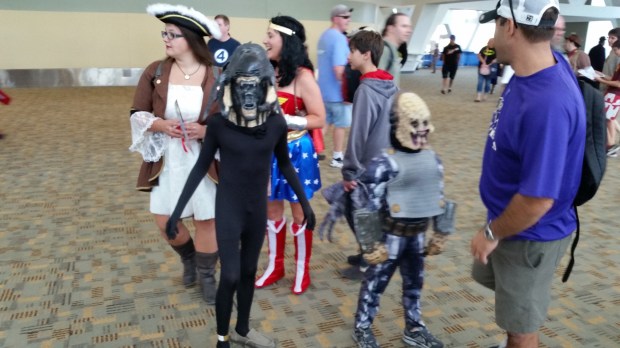 An alien among some other costumes.