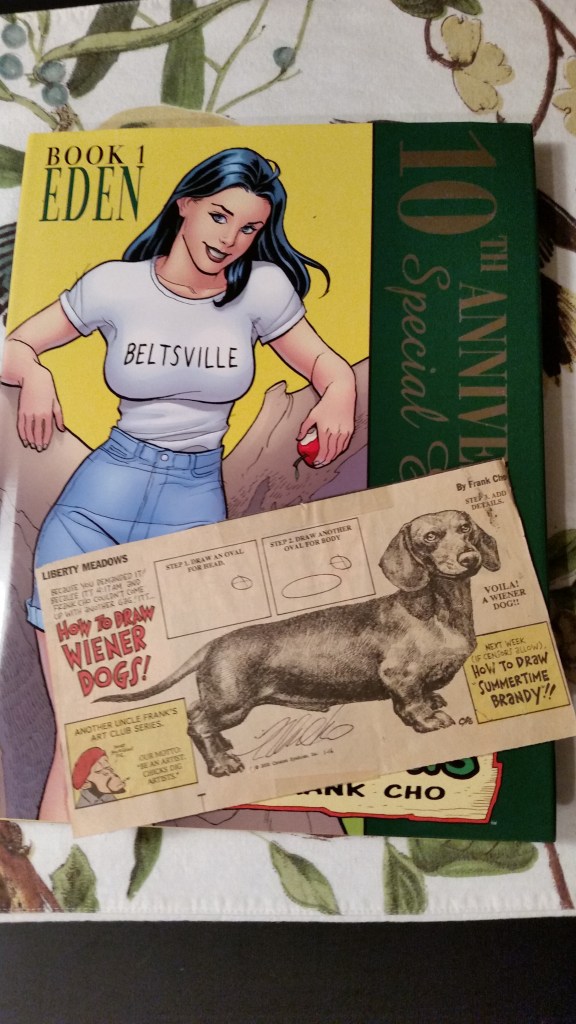 The Liberty Meadows hardcover and old Washington Post Sunday strip that I had signed by Frank Cho.